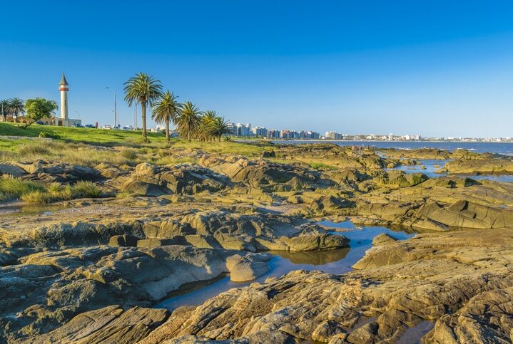 Sunny day at rocky coastal scene in Montevideo city, Uruguay