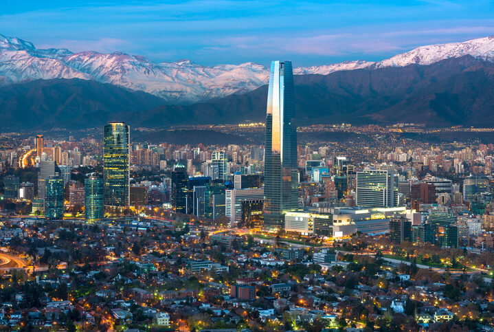 Panoramic view of Providencia and Las Condes districts with Costanera Center skyscraper, Titanium Tower and Los Andes Mountain Range, Santiago de Chile